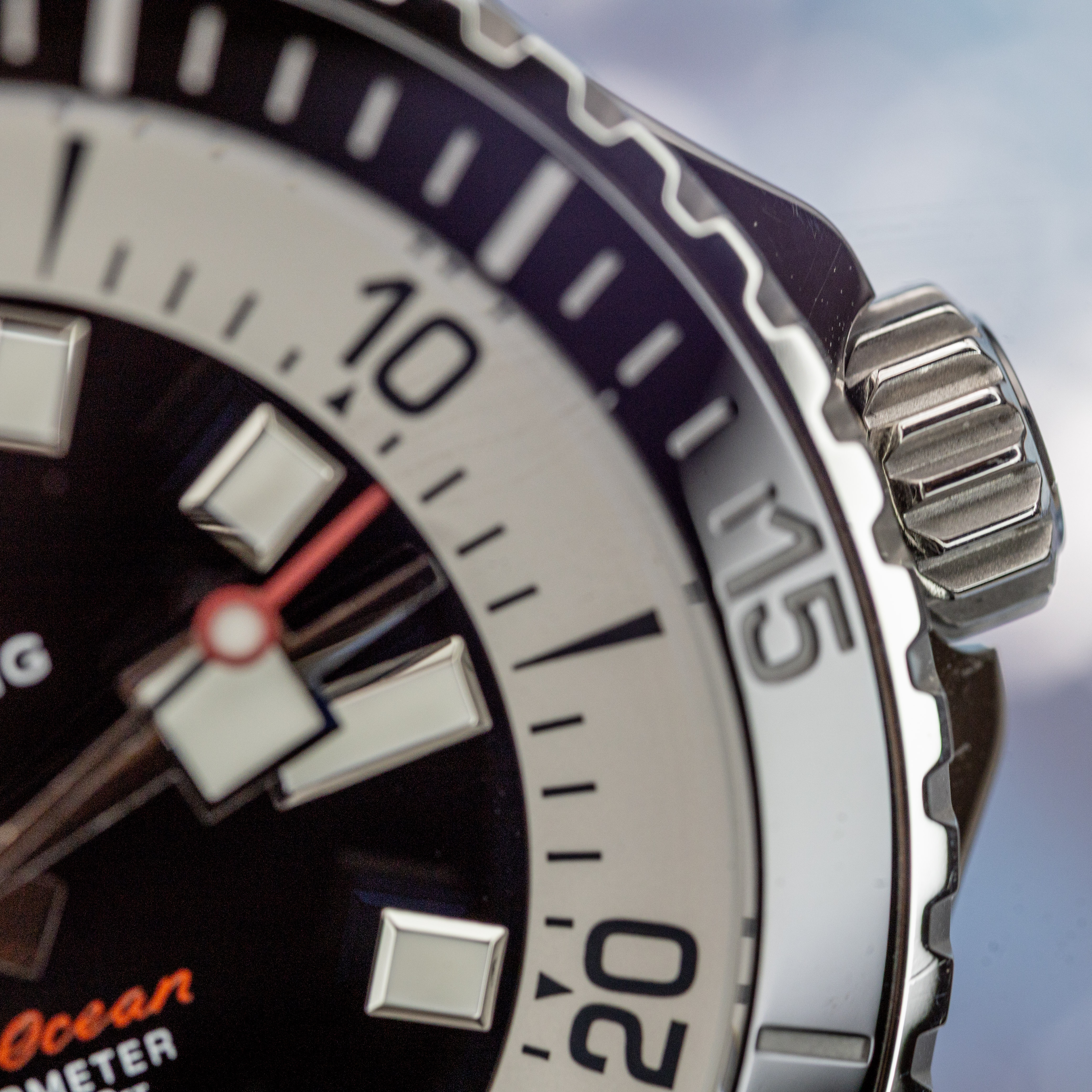 Breitling Superocean 44 bezel and crown close-up showing red seconds hand