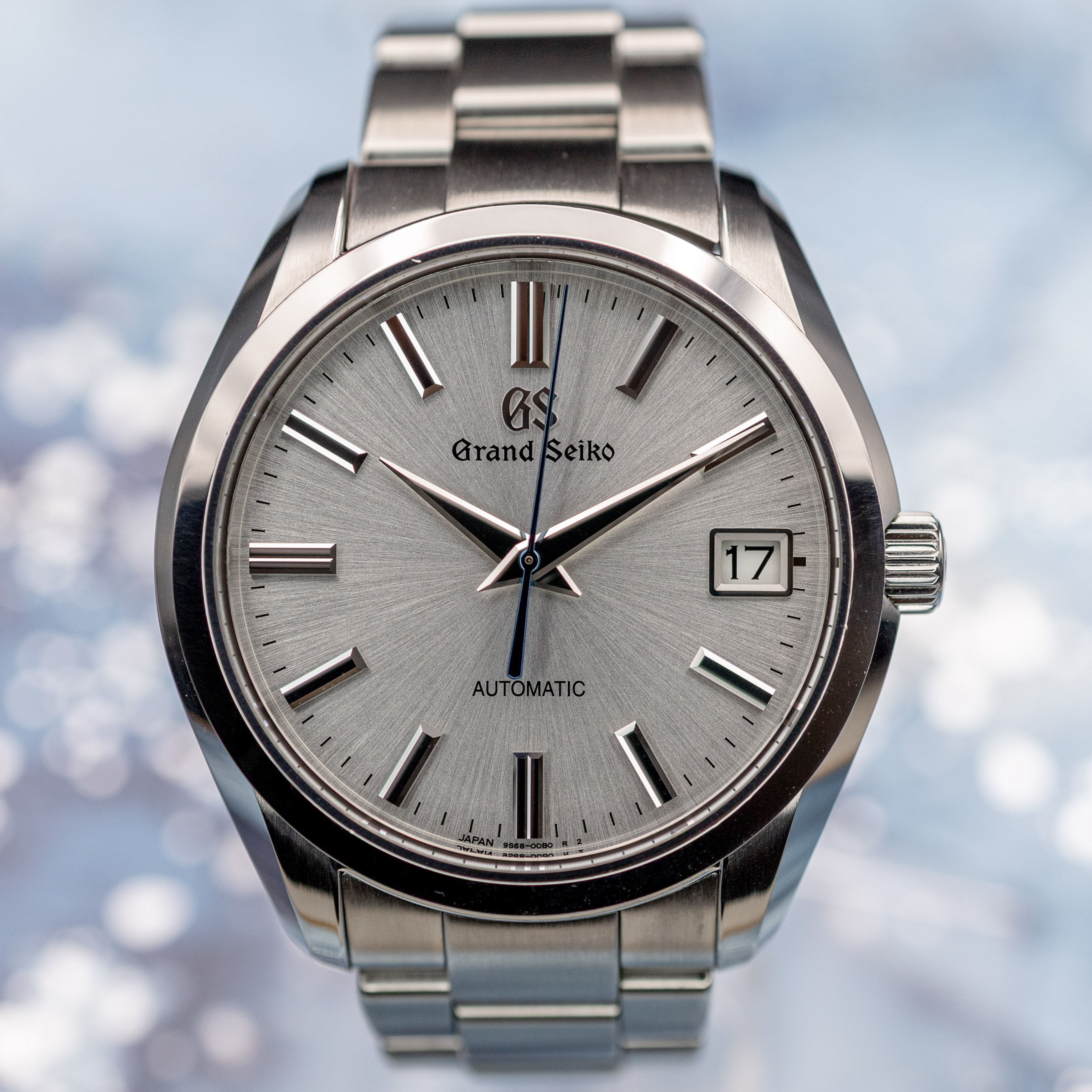 Grand Seiko SBGR307 full view on surface