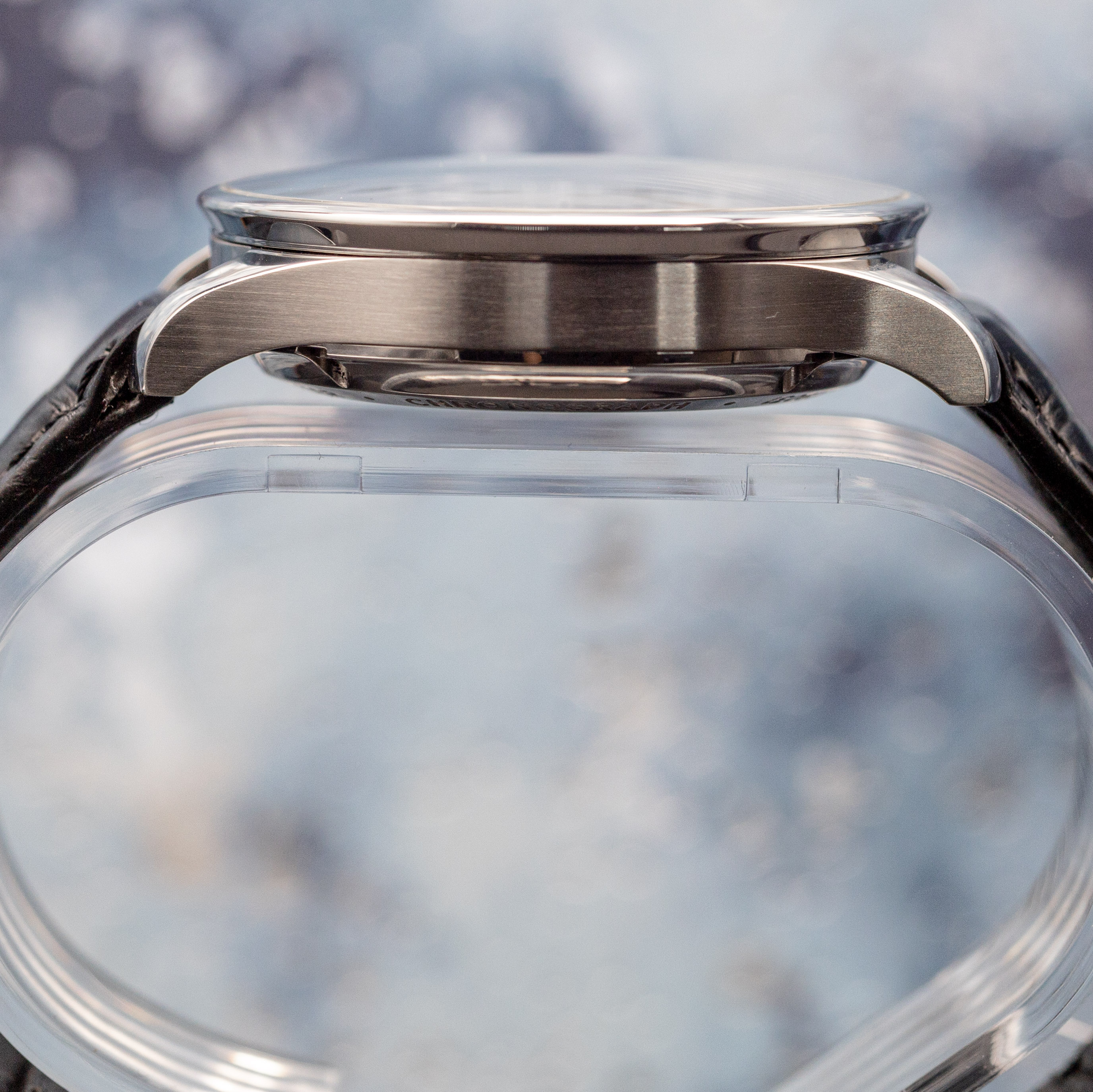 IWC Portugieser Chronograph black dial front view showing subdials and Arabic numerals