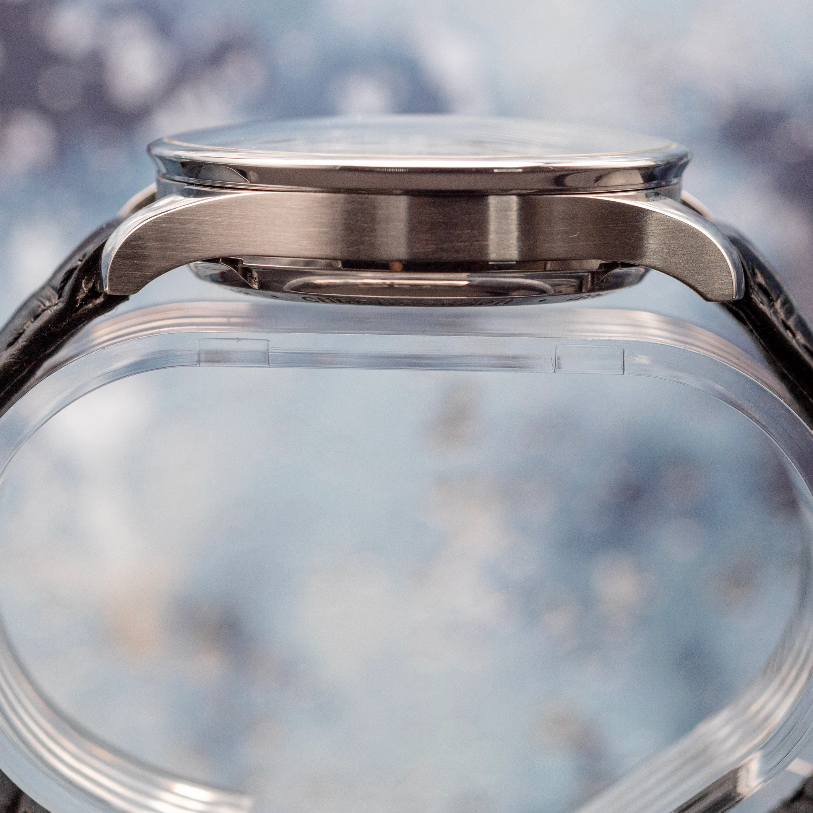 IWC Portugieser Chronograph black dial front view showing subdials and Arabic numerals