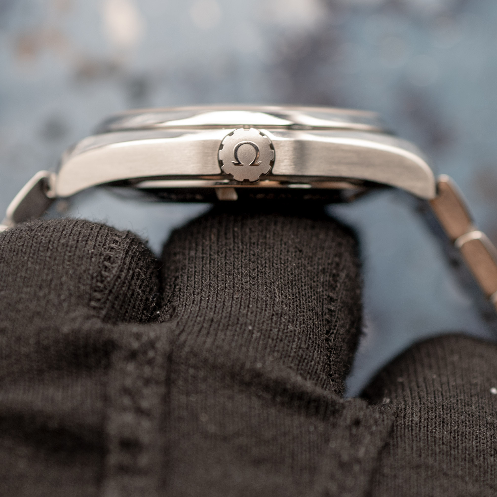 Omega crown detail with Omega logo engraving