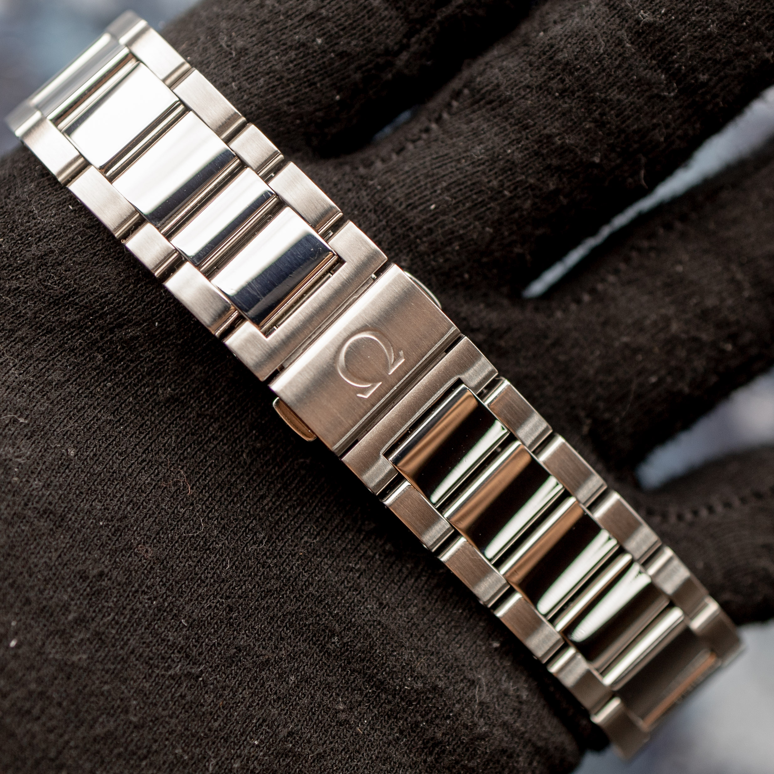 Omega Aqua Terra bracelet clasp detail with Omega logo