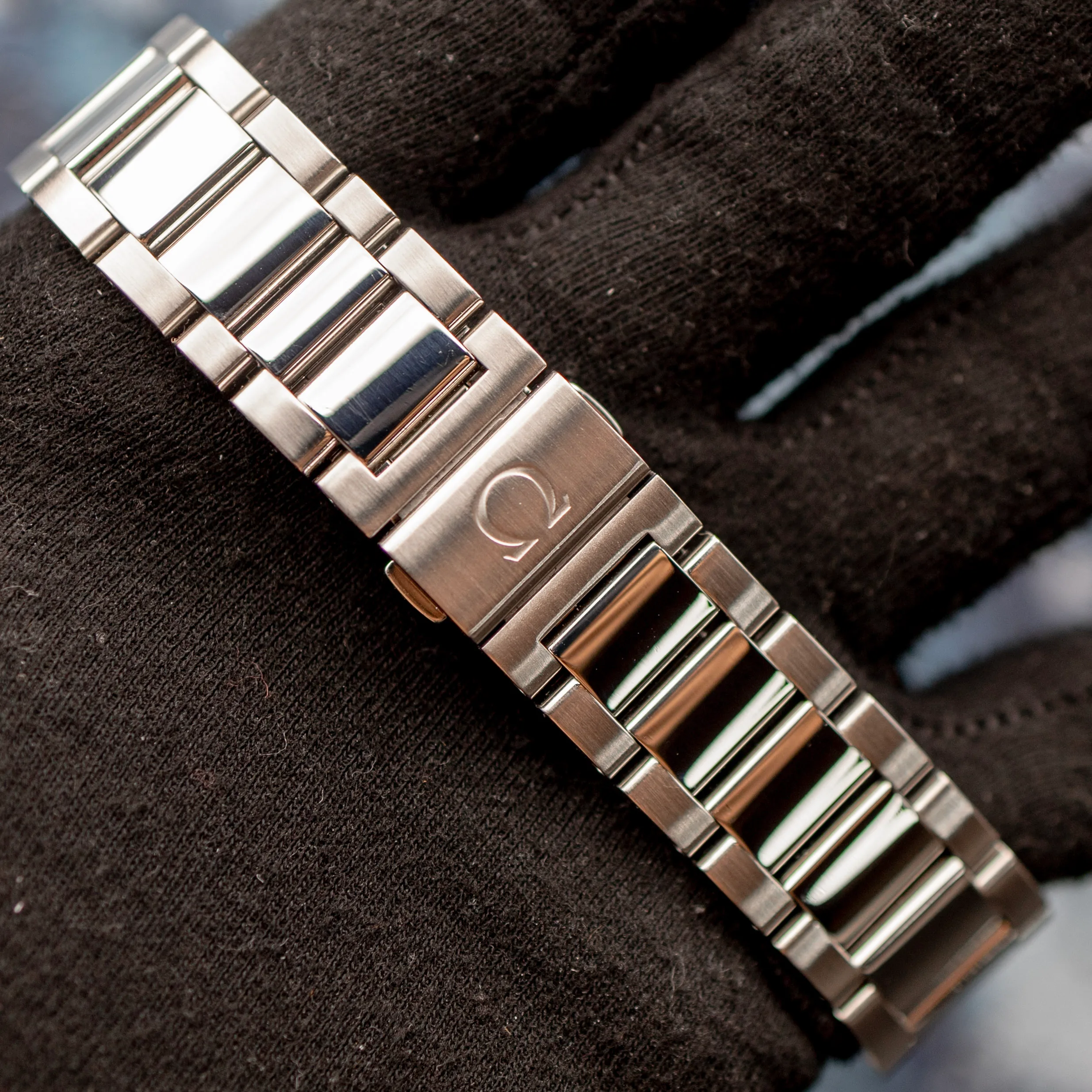 Omega Aqua Terra bracelet clasp detail with Omega logo