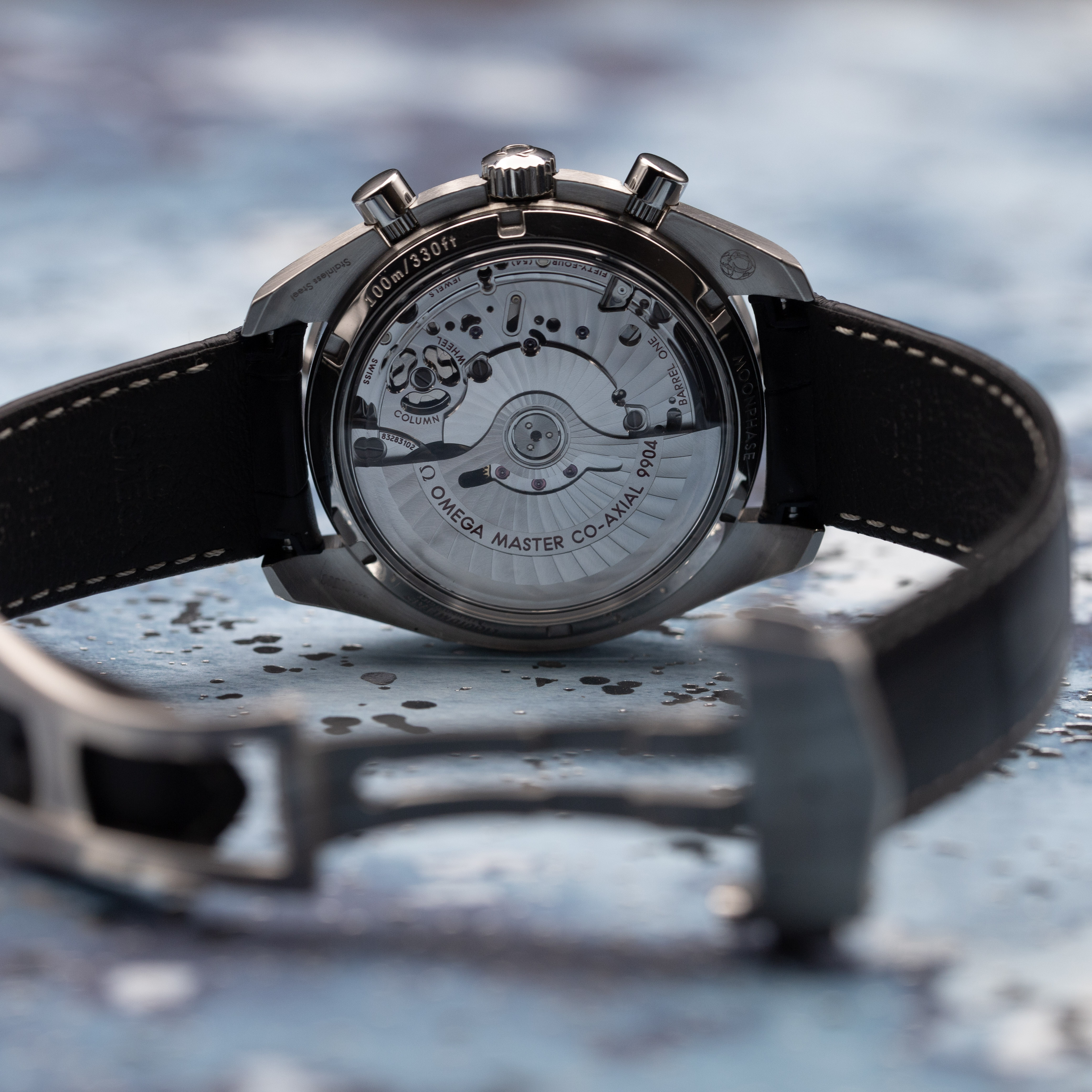 Omega Speedmaster Moonphase deployant clasp and blue alligator strap detail