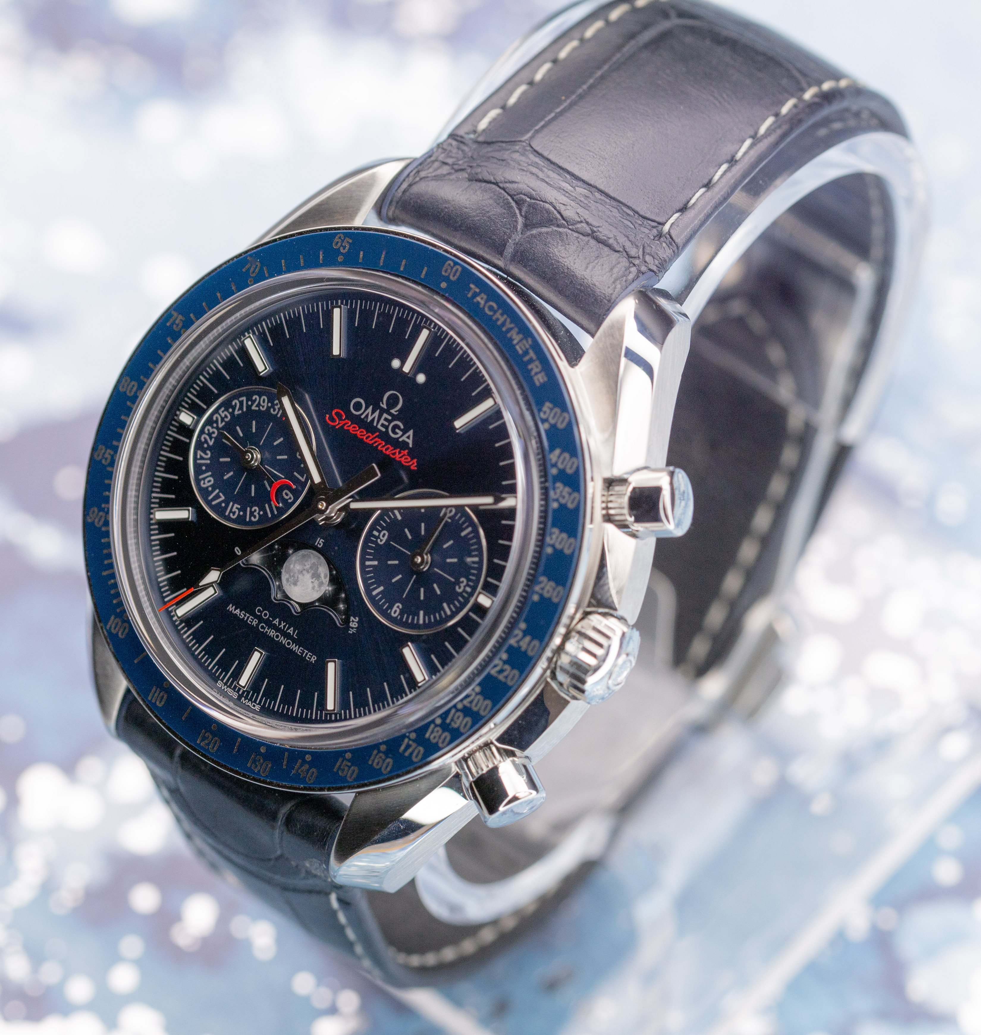 Omega Speedmaster Moonphase complete set with box, warranty cards, and papers