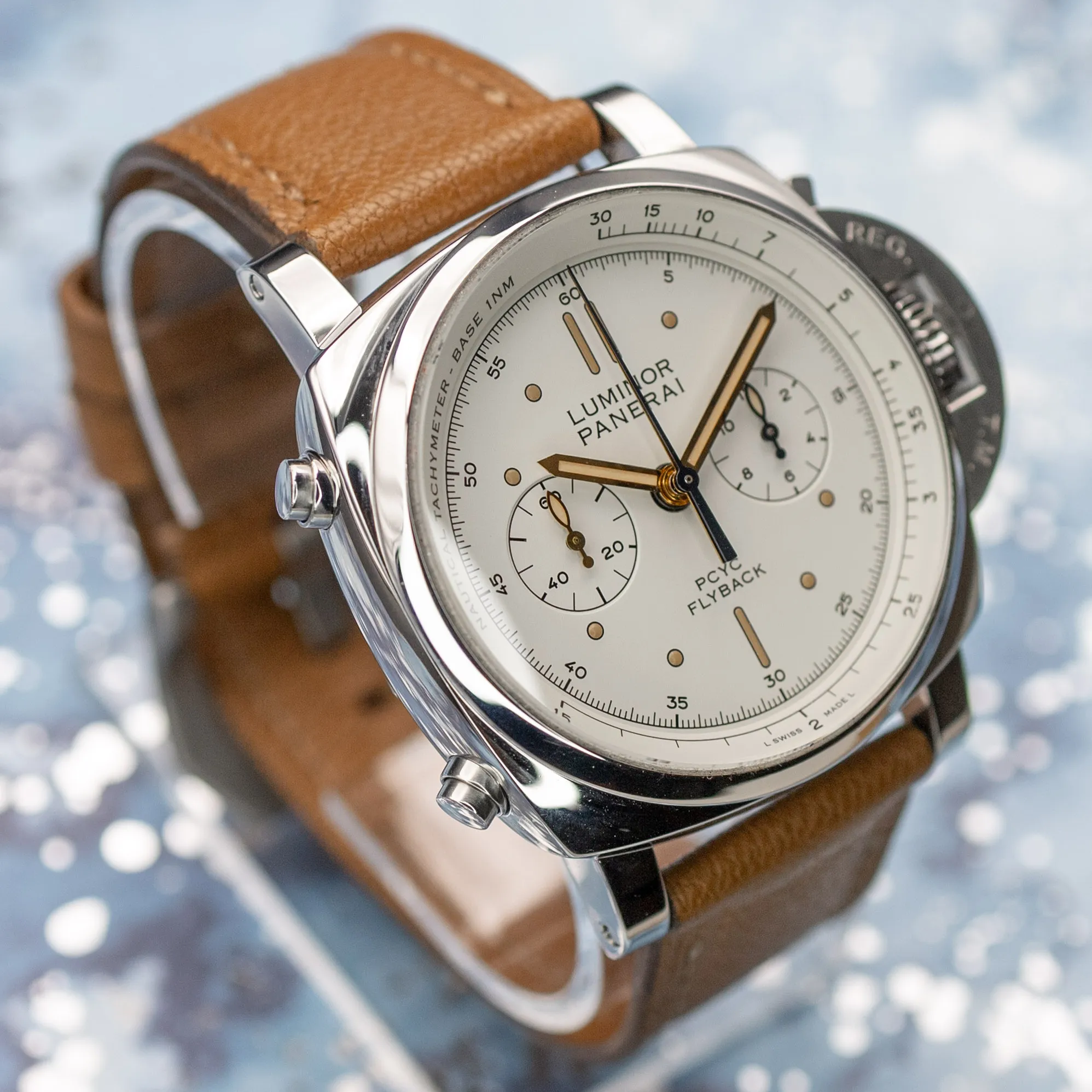 Panerai PAM00654 dial macro showing chronograph sub dials, nautical tachymeter and PCYC Flyback text