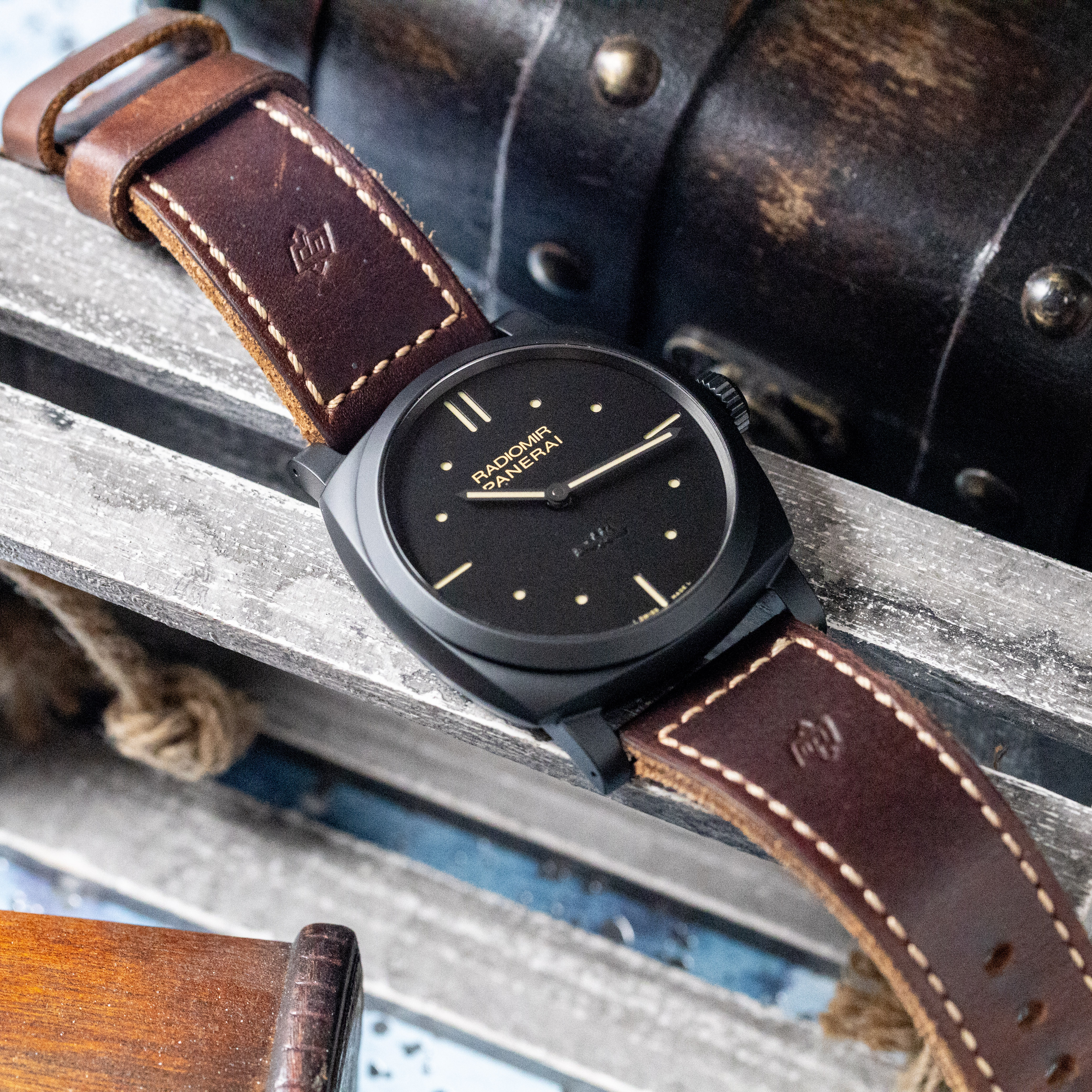 Panerai PAM00577 full watch on wooden backdrop showing 48mm proportions