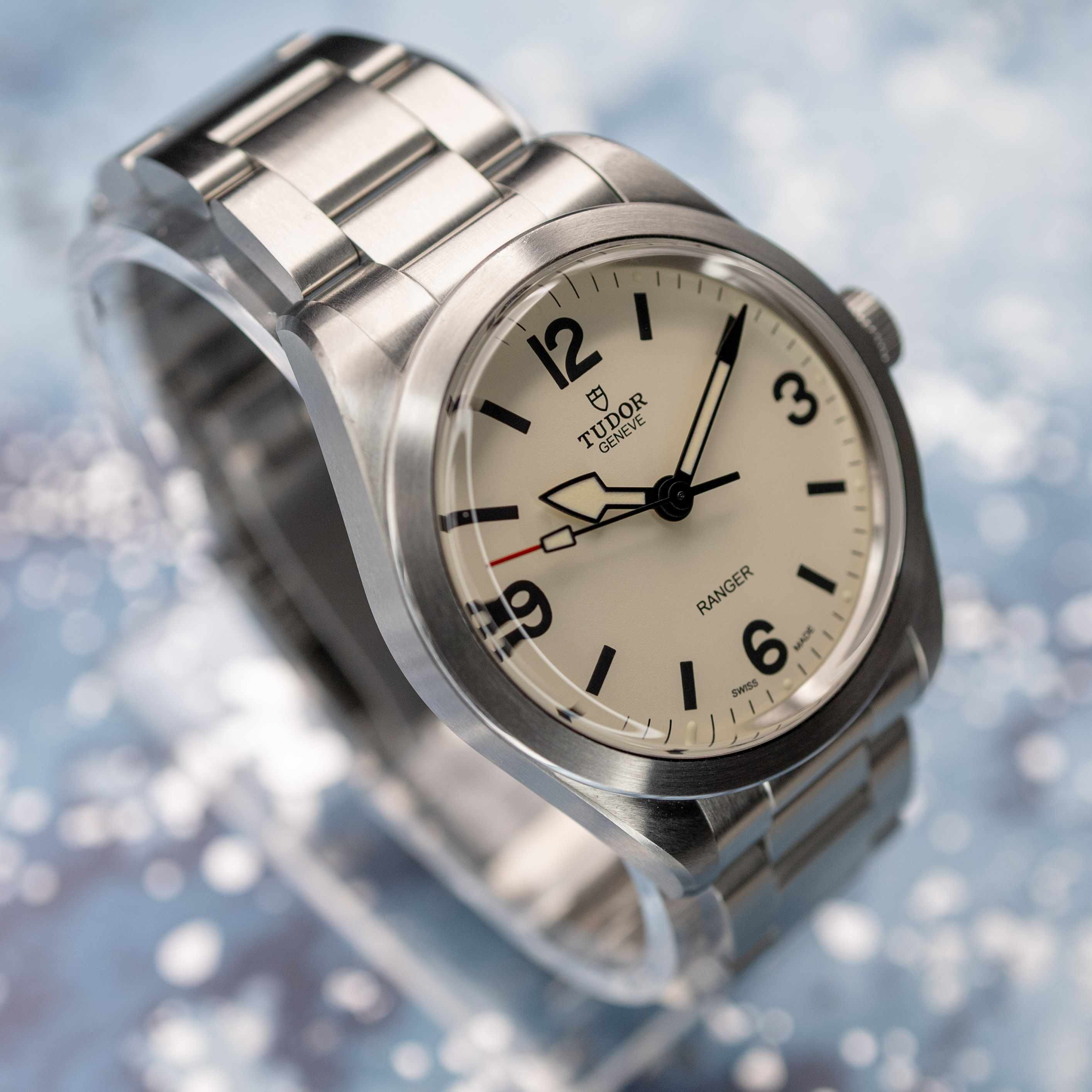 Tudor Ranger 79950 Dune beige dial angled on reflective surface