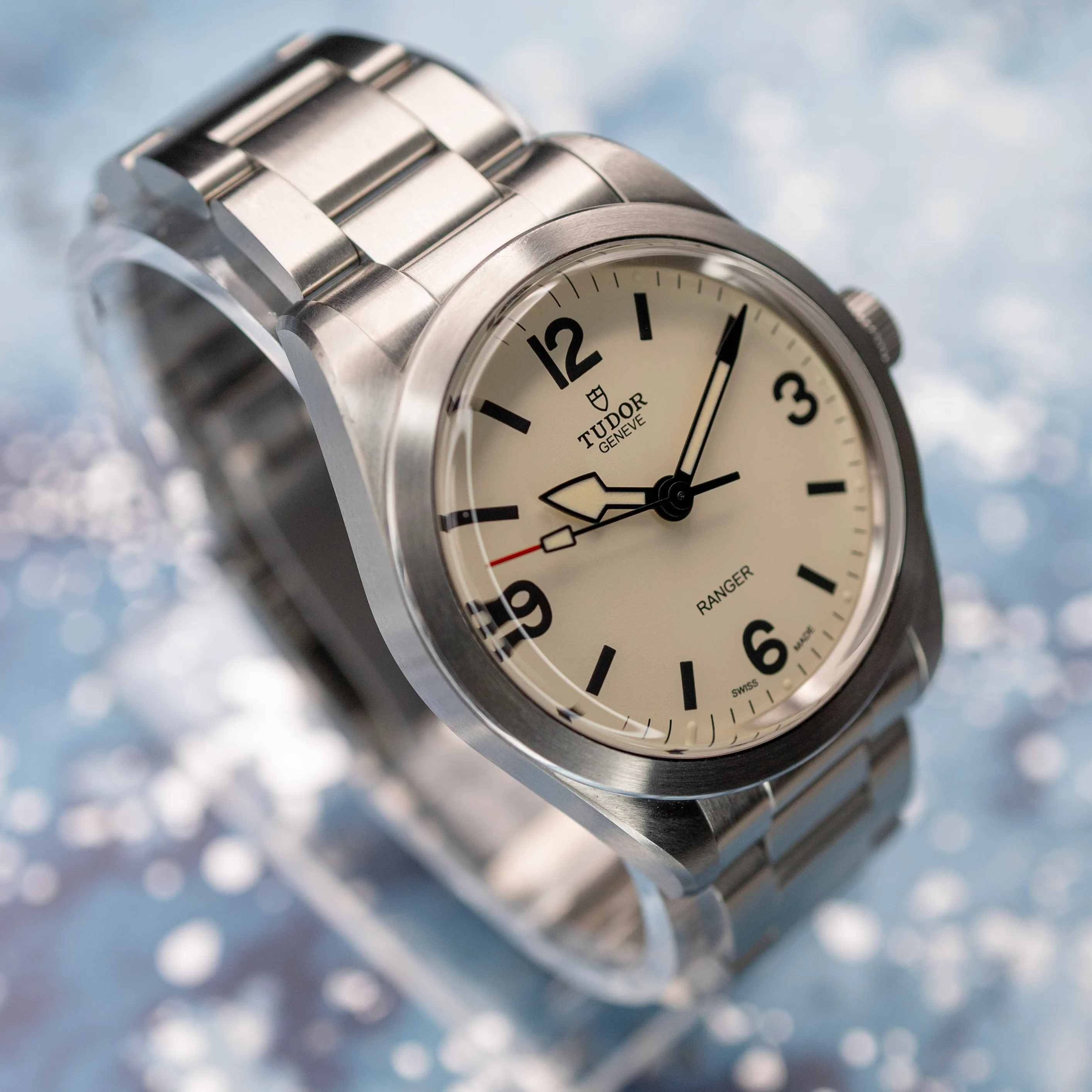 Tudor Ranger 79950 Dune beige dial angled on reflective surface